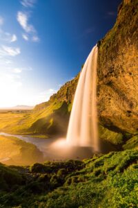 Waterfall in green landscape
