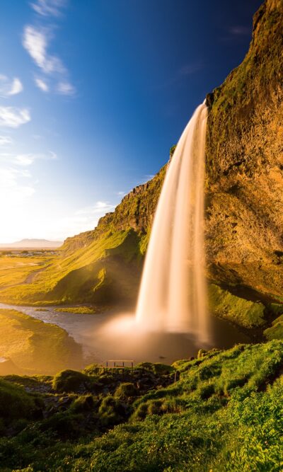 Waterfall in green landscape