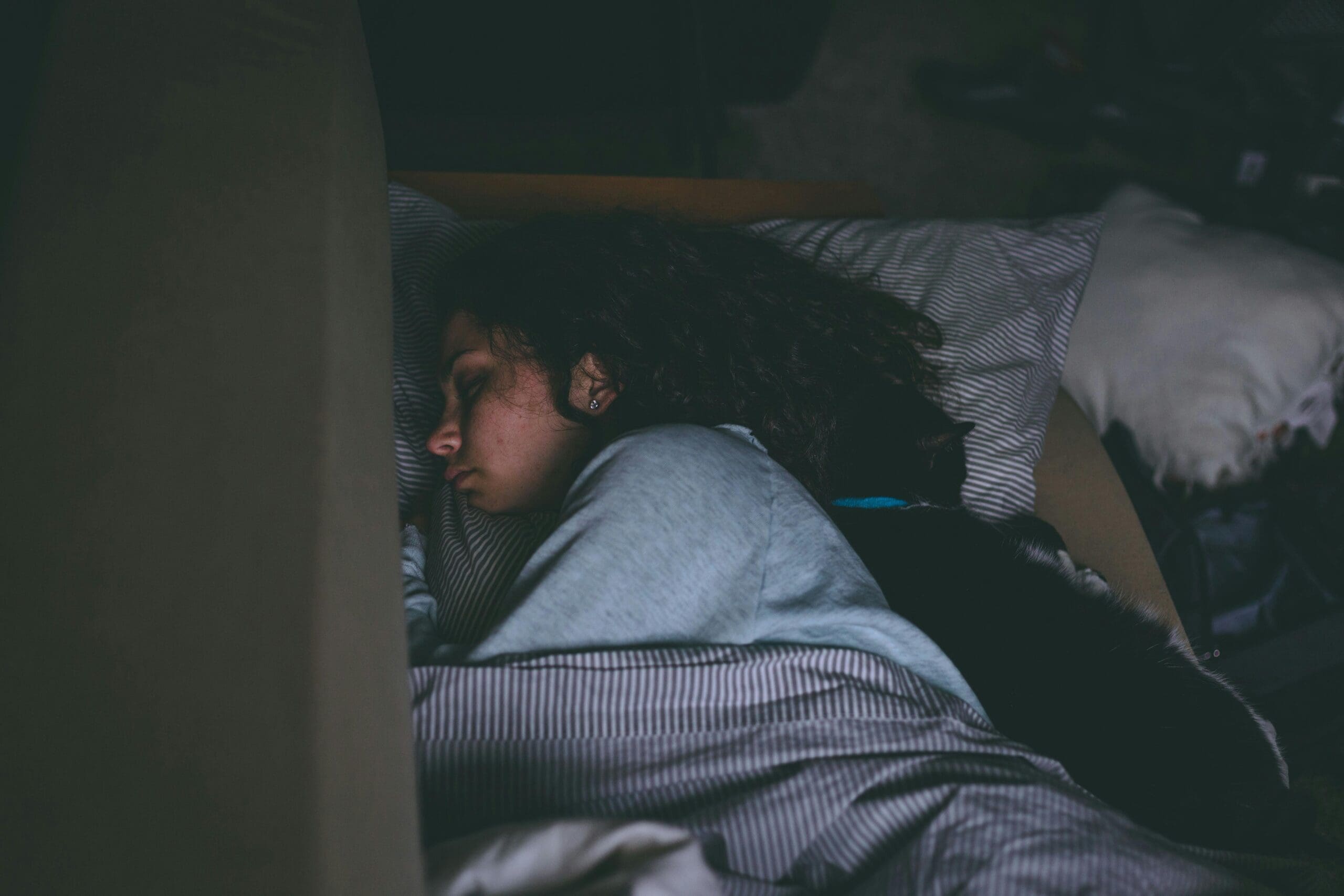 woman, with a calm morning ritual, sleeping in bed