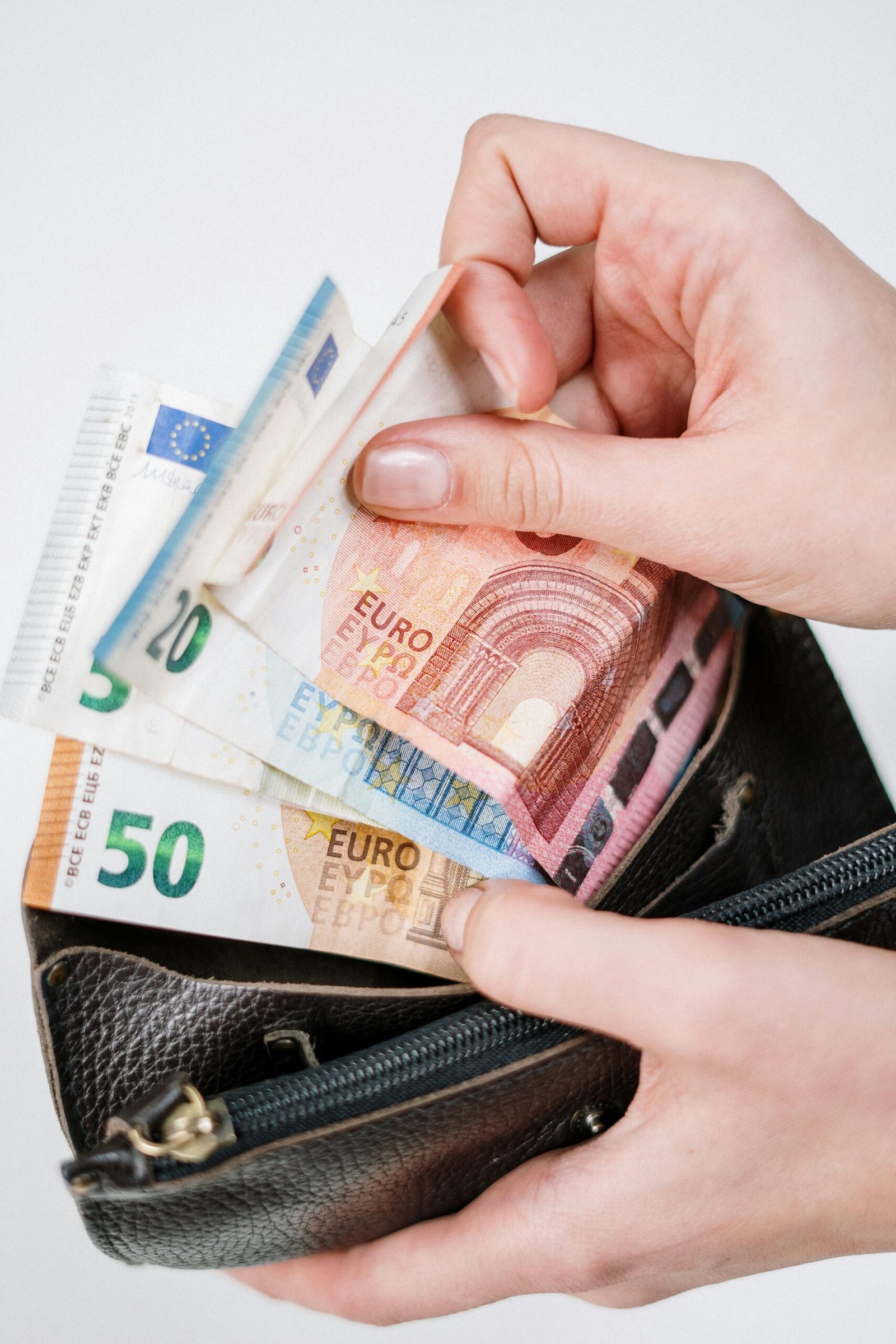 Wallet containing Euro bills. Financial stress can have effect on your mental health