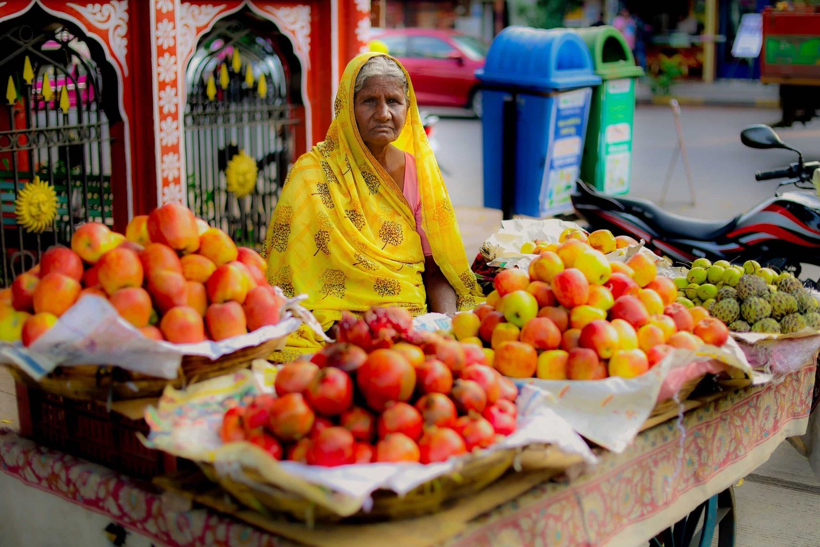 Woman selling vitamins (fruit) on the street